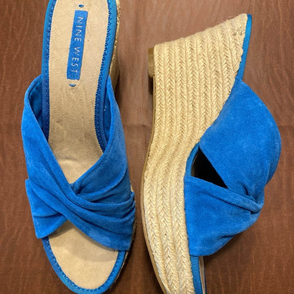 Vibrant Blue Suede Wedge Sandals with Knotted Design
NWOT